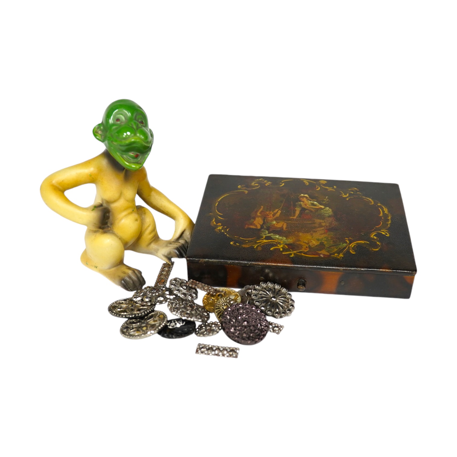 A Victorian papier mache box, a foreign porcelain novelty monkey and cut steel buttons, largest 13cm wide. Condition - fair